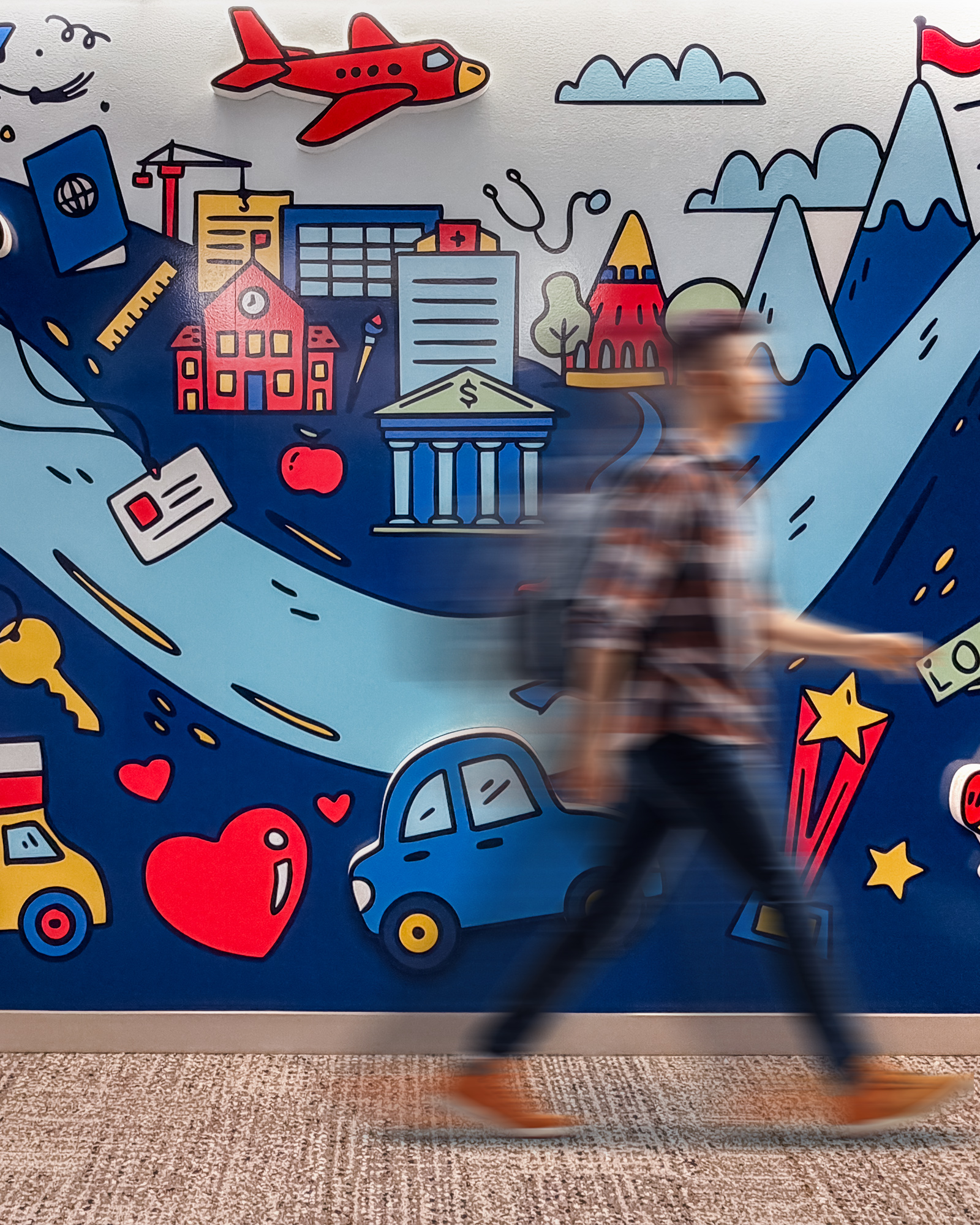 Colorful mural with abstract cityscape elements.