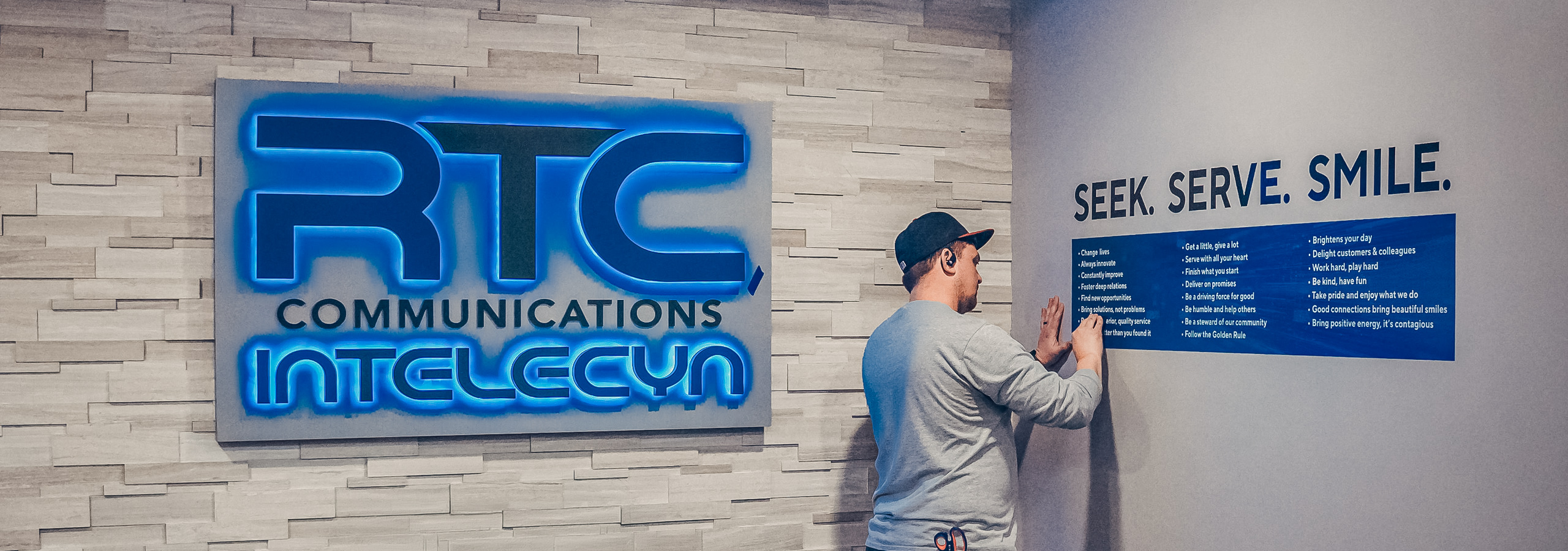 RTC interior wall vinyl branding installation.