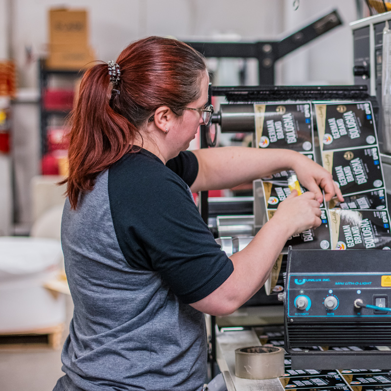 SLADE employee printing labels.