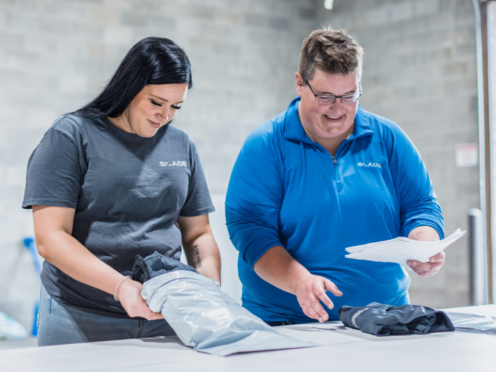 SLADE employees fulfilling orders.