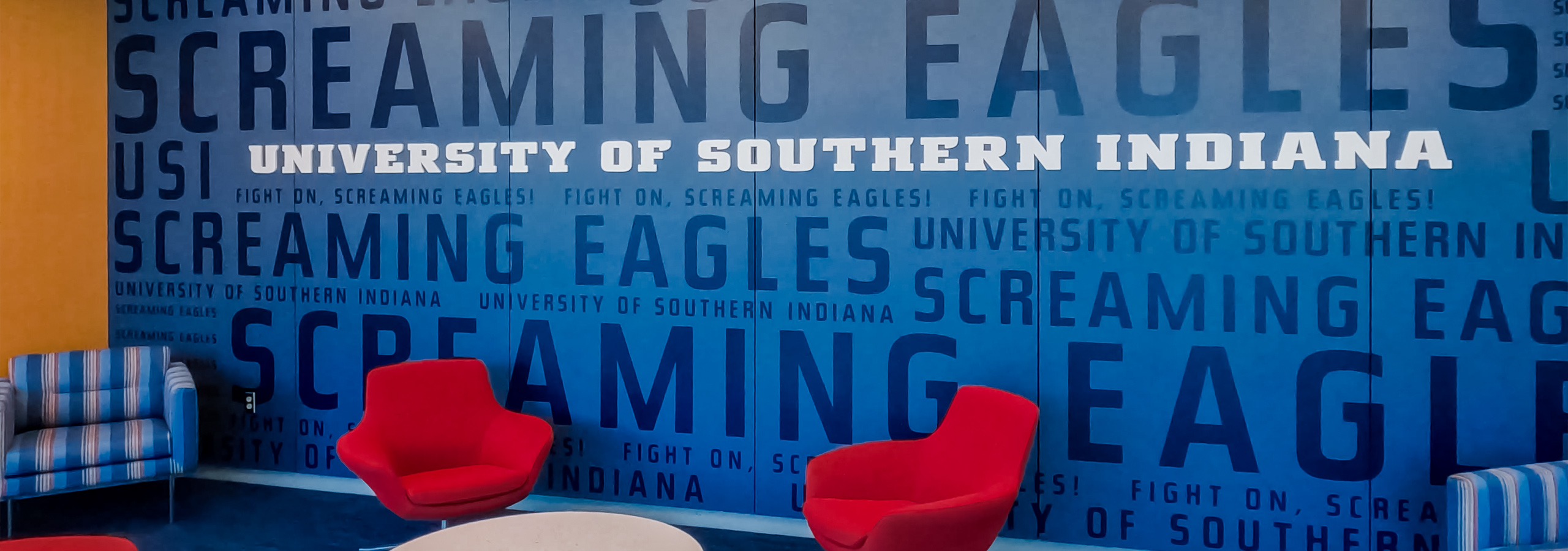 USI athletic facility wall graphic lettering.