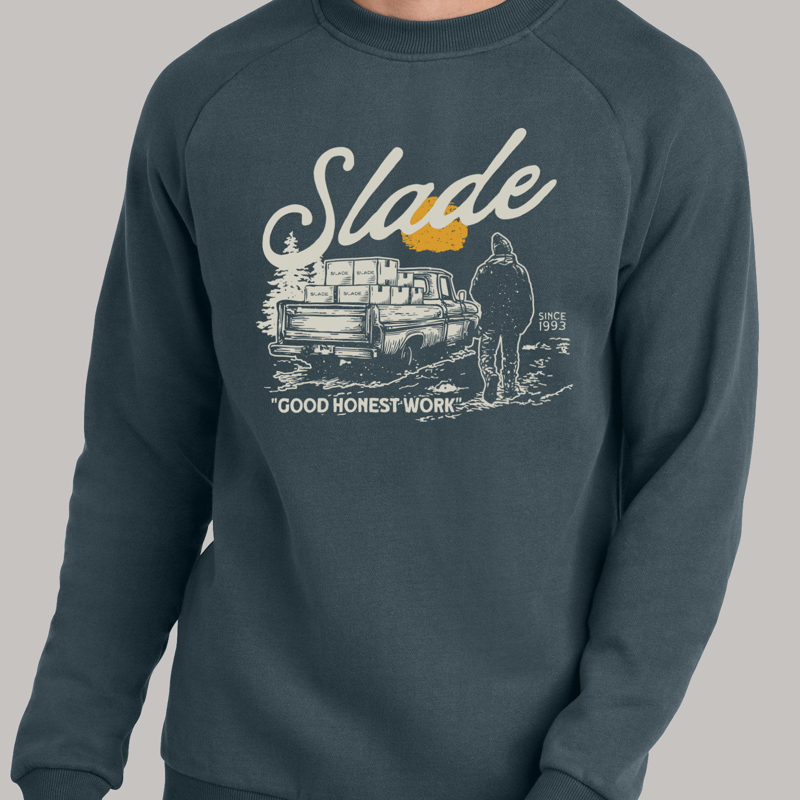 Dark sweatshirt with a large Slade graphic printed across the front.
