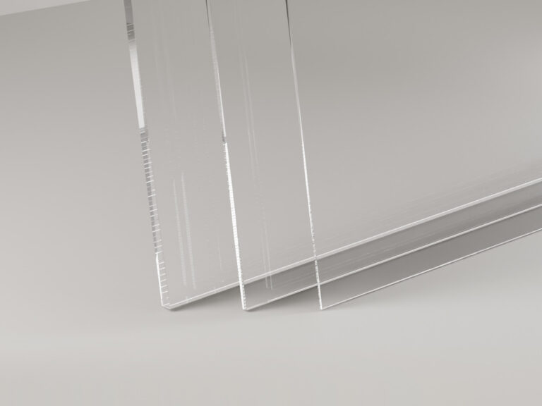 Clear acrylic sheets stacked over one another, with the layered edges visible.