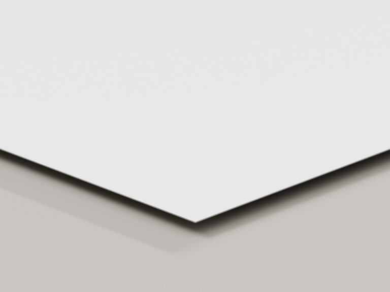 Thin white sign panel shown at an angle to reveal its edge.