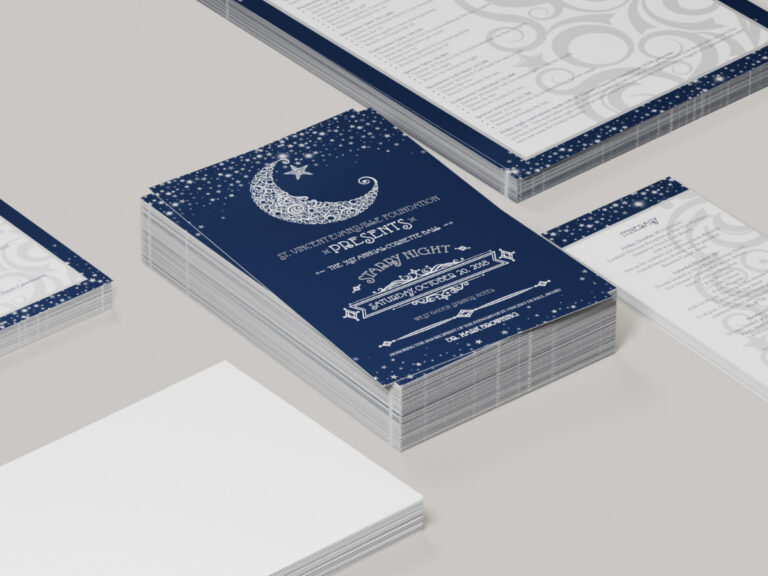 Navy Starry Night gala invitations with a crescent moon, stars and matching printed itineraries.