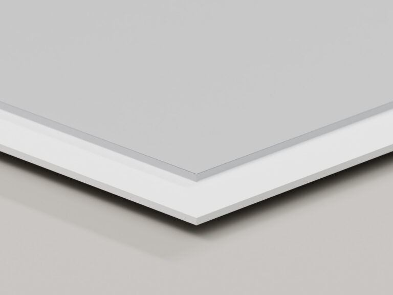 Translucent sheet stacked over white sign panels, showing the layered edges.