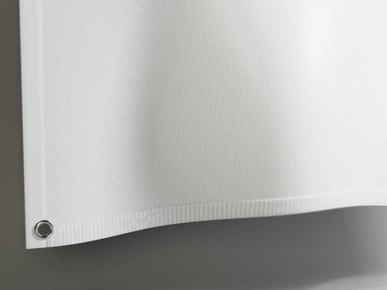 White banner corner with a woven texture, reinforced hem and metal grommet.